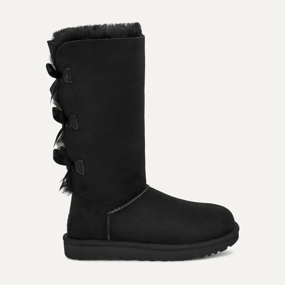 UGG Black Boots with Plush Lining and Decorative Bows